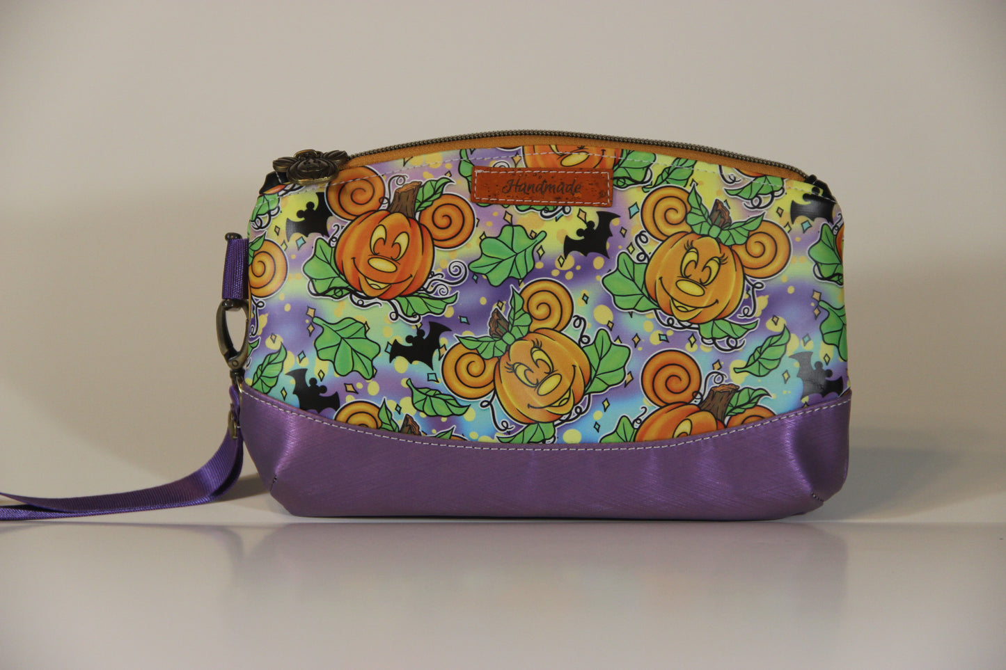 Clematis Wristlet with your favorite mouse! All faux leather.